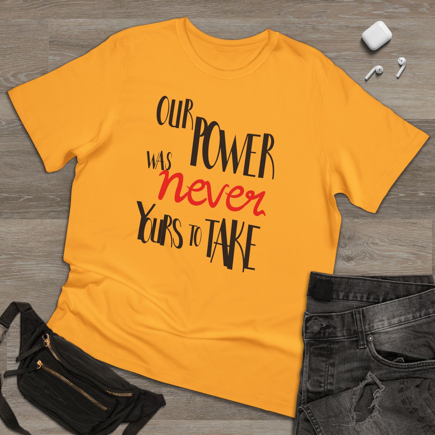 Unisex T-shirt with 'Our Power Was Never Yours to Take' Design